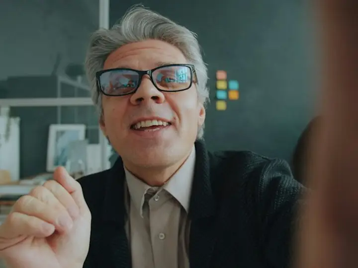 A businessman talking on a video call